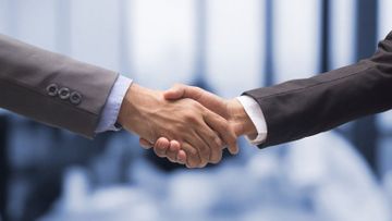 Shaking hands with a client